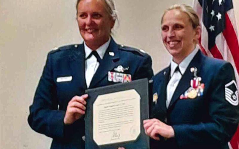 Lieutenant Colonel Lisha T. Wallace, left, is pictured with Master Sergeant Laura Ash at her retirement ceremony.