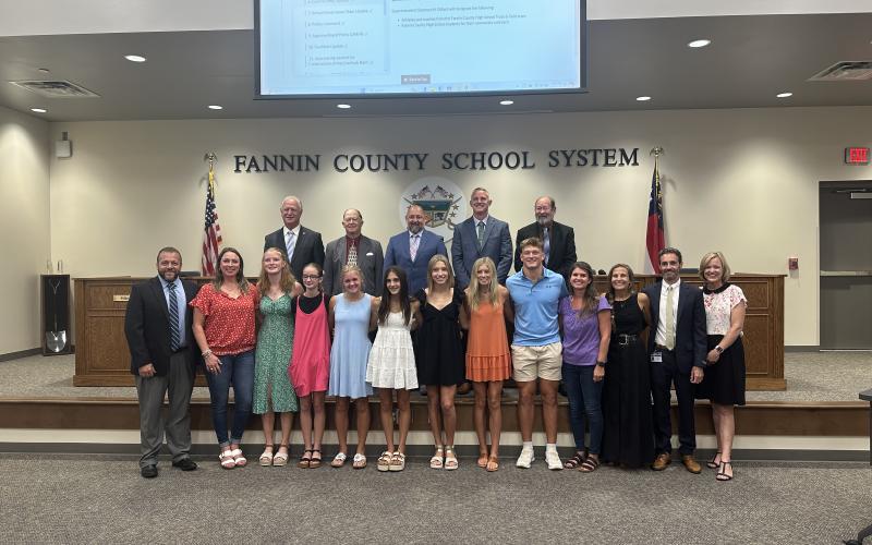The Fannin County High School Track team was recognized at last week’s Fannin County School Board meeting. Pictured are, from left, back row, school board members Terry Bramlett, Bobby Bearden, Mike Cole, Chad Galloway and Lewis DeWeese; and, front row, Dr. Scott Ramsey, Alden Falls, Airianna Galloway, Annaleigh Cheatham, Karli Sams, Ava Acker, Lindsey Holloway, Cooper Born, Katherine Cheatham, Miranda Roof, Dr. Lucas Roof and School Superintendent Shannon Dillard.