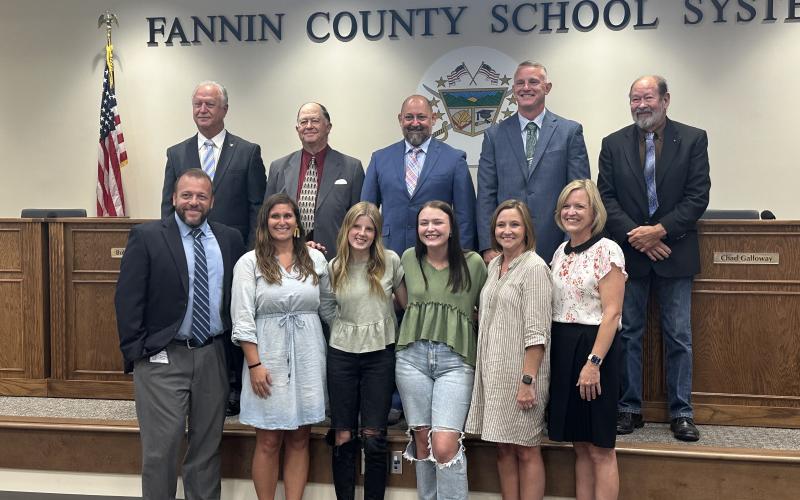 Fannin County High School students were recognized at last week’s Fannin County school board meeting after raising over $15,000 in funds to help those in need. Pictured are, from left, back row, school board members Terry Bramlett, Bobby Bearden, Mike Cole, Chad Galloway and Lewis DeWeese; and, front row, Dr. Scott Ramsey, Brittany Stinnett, Jordan Golden, Ryleigh Loudermilk, Dawn Heaton and Superintendent Shannon Dillard.