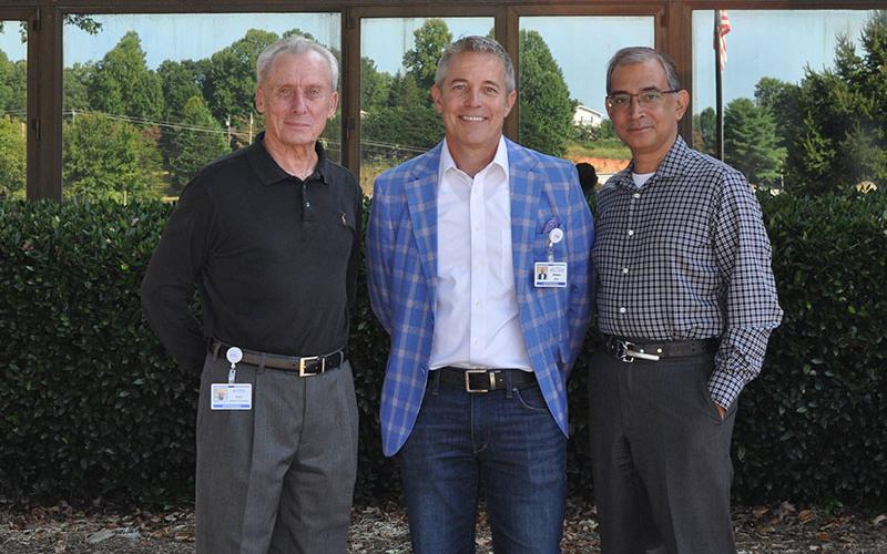 Gary Poquette, left, is the new CEO of Blue Ridge Medical Center, succeeding William “Ed” Henry, middle. Also there to announce the change of reigns is Java Health Chief Executive Officer Bappa Mukherji.