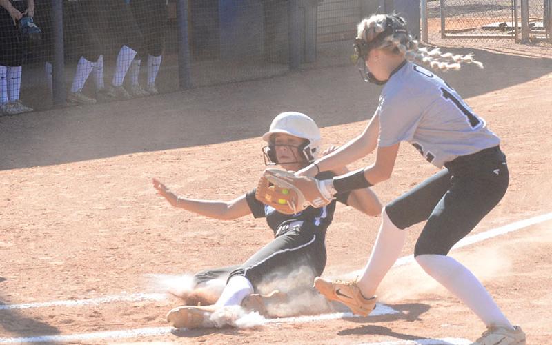 Myla Rogers (8) slides under the catcher’s tag at home plate to add to the Lady Rebels’ side of the scoreboard in action against region foe Coosa. The Lady Rebels won the game handily on their home field with a 15-0 decision Tuesday, August 20. At the end of last week, Fannin County was 6-1 overall, their only loss coming against Dade County