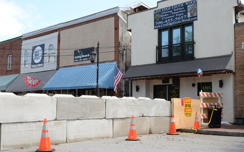 Deaf Man Vinyl, Jumping Mouse Beads, and Live Edge Exotic Wood are all closed because of the wall collapse at Jumping Mouse Beads.
