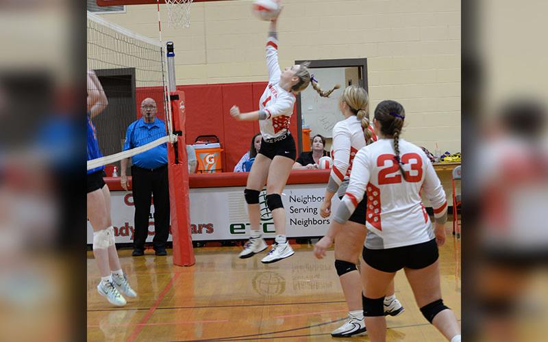 Alexis Hyatt (#1) goes for a kill in recent Copper Basin action. She led the team with five kills against North Georgia Christian Academy.