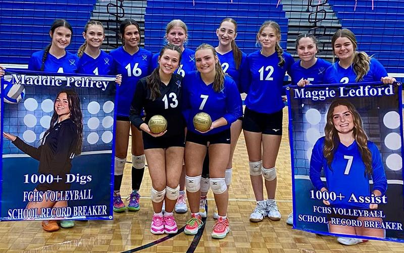 The Fannin County Lady Rebels volleyball team recently celebrated record setting performances by two of its own, Maddie Pelfrey and Maggie Ledford. Pelfrey, front at left, was honored for over 1,000 digs and Ledford, front at right, was recognized for over 1,000 assists.  Honoring their teammates are, back, from left, Bailee Stiles, Kaylie Davenport, Rylee King, Kendall Clore, Karis Hurd, Keslie Kea, Ashlyn Jones and Maya Butler.