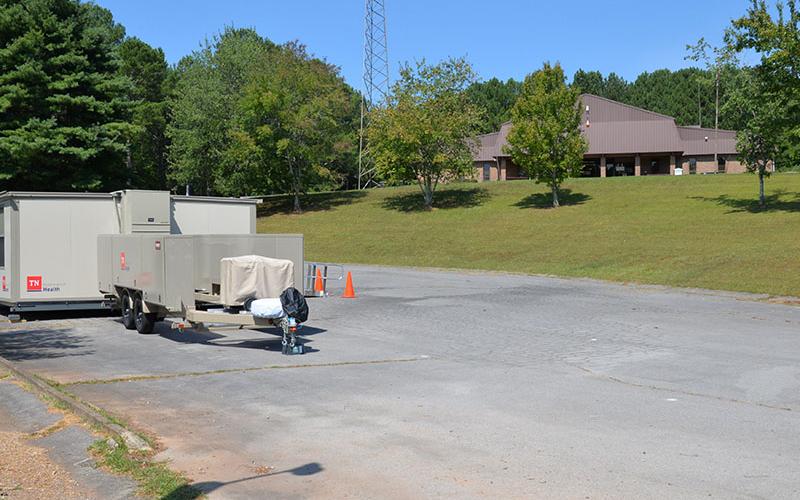 A portable building that will house the Polk County Health Department now sits in the lower parking lot below the Copper Basin Senior Center. County Executive Robby Hatcher said he is working on two more buildings, one of which has been confirmed, so that other services provided in the senior center can continue during repairs.
