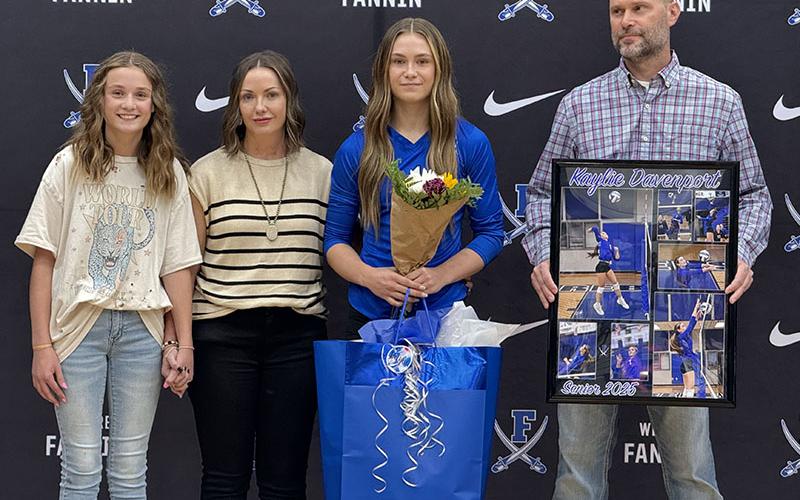 Kaylie Davenport was one of four Fannin County Lady Rebel volleyball players honored on Senior Night. She was escorted by Kellie, Matthew and Bella Davenport.