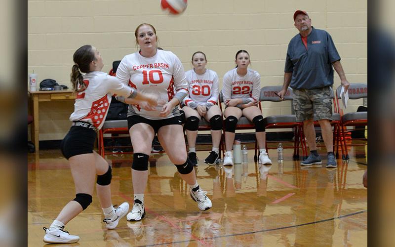 Savanna Bloodworth and Claire Ledford (#10) are shown in recent action for the Lady Cougars.