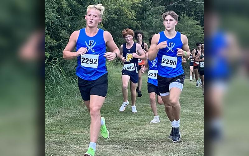 Gage Bryan (#2292) and Brodey Angel are shown in the TFS Heroes Invitational cross country meet. The Fannin County High School boys cross country team competed in the TFS Heroes Invitational August 29. Head coach Miranda Roof said, “This was a very challenging cross country course on an extremely hot day. However, our boys ran with heart and toughness.” Junior Hudson Lynch led the team, placing 14th out of 120 runners.