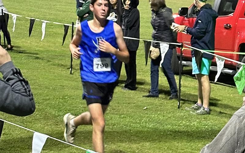 Henry Scheuenman ran his best time.