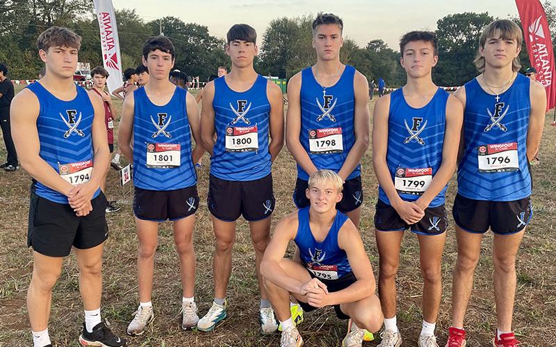 Fannin County’s cross country boys team, from left, standing, Brodey Angel, Henry Schueneman, Austin Prieto, Hudson Lynch, Matthew Ponton, and Rylin Davis; and, kneeling, Gage Bryan qualified to run in the Varsity A Race at the Wingfoot XC Classic at Sam Smith Park in Cartersville.