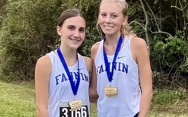 Karli Sams and Lindsey Holloway both received medals for their Mountain Invitational finishes.