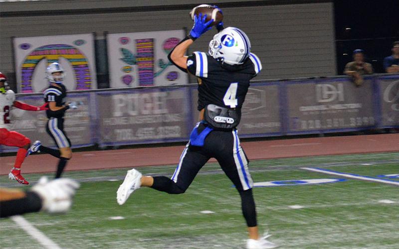 Braden Taylor (#4) hauled in this Lawson Sullivan pass for a touchdown in the Fannin County victory over the Chattooga Indians.