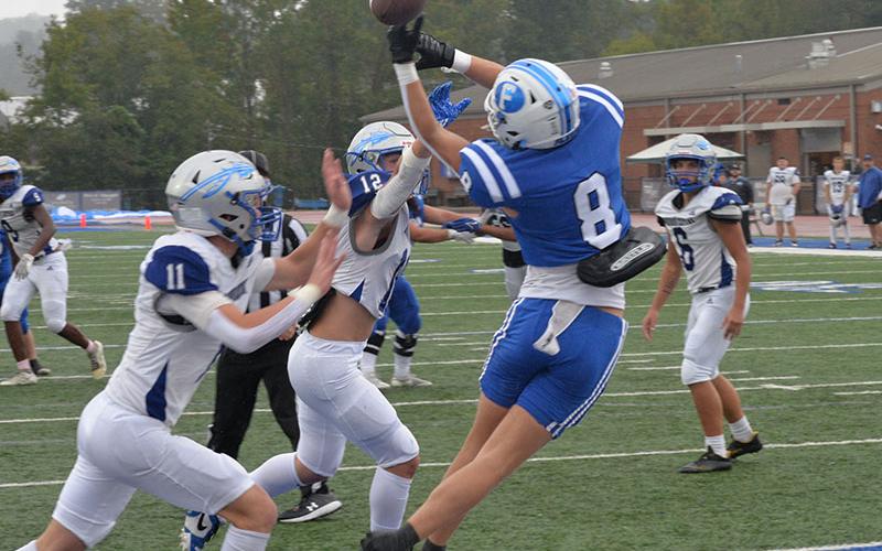 Judah Wood (#8) stretches to catch a Lawson Sullivan against the Gordon Central Warriors Saturday afternoon at Fannin County High School stadium. Wood had one catch in the game.