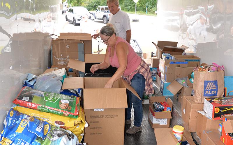 Volunteers organized and sorted the many donations that left from Fire Station #1 in Blue Ridge in trailers headed for North Carolina.