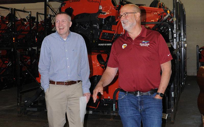 During the Whitepath building tour, FCDA Executive Director Erick Youngberg, right, guided attendees through the newly renovated warehouse which is currently being used by Mason Tractor. Pictured with Youngberg is FCDA board member Cory Callahan.