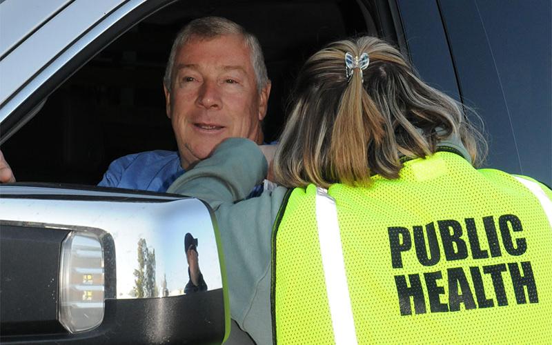 Robert Graham gets his annual flu shot at the North Georgia Health District’s Drive-Thru Flu Shot Clinic at the Blue Ridge Farmer’s Market Tuesday, October 8.