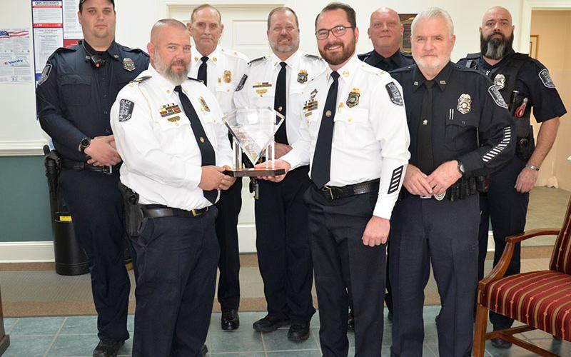 Members of the McCaysville Police Department display the first place trophy representing the department’s success in the Governor’s Challenge competition sponsored by the Governor’s Office of Highway Safety. With the award are, from left, Officer Steve Bennett, Assistant Chief Cory Collogan, Assistant Chief Bill Cole, Lieutenant Brian Collis, Chief Michael Earley and officers Brandon Patterson, Pete Kusek and Eric Fears.