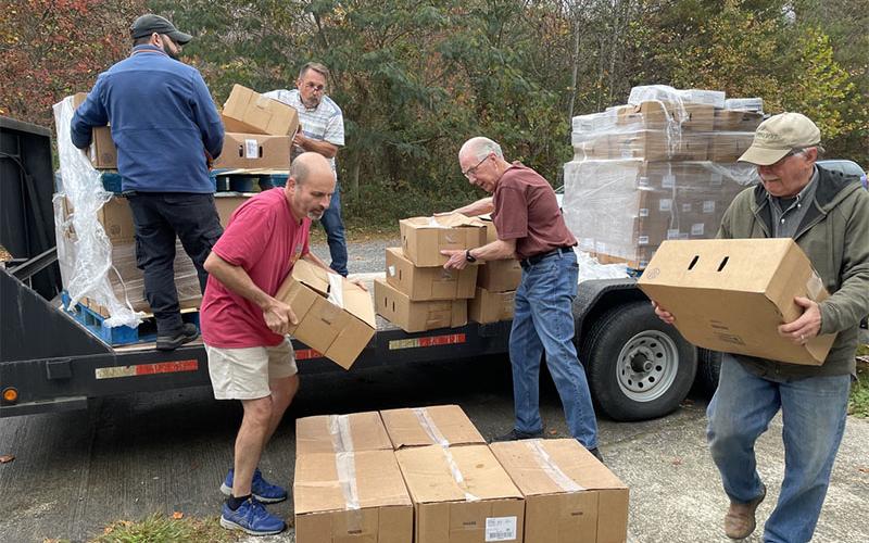This dedicated group of volunteers are pictured unloading their first shipment of hams and turkeys for Feed Fannin’s Holiday Meals Campaign.
