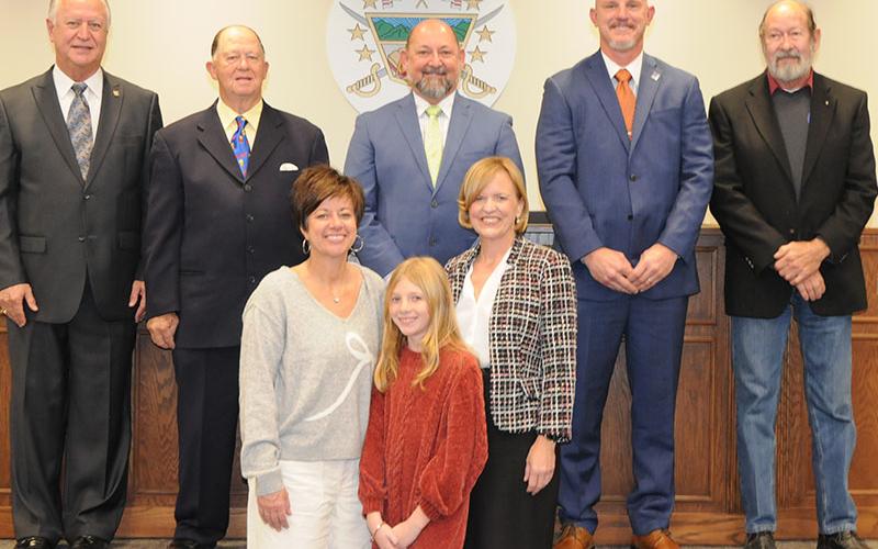 West Fannin Elementary School student Eva Key was recognized during the Fannin County Board of Education’s November 14 meeting for her winning the November 2024 Fire Safety Poster Contest through the Georgia Office of Commissioner of Insurance and Safety Fire. Key is shown with Principal Alison Danner, left, and Superintendent Shannon Dillard.