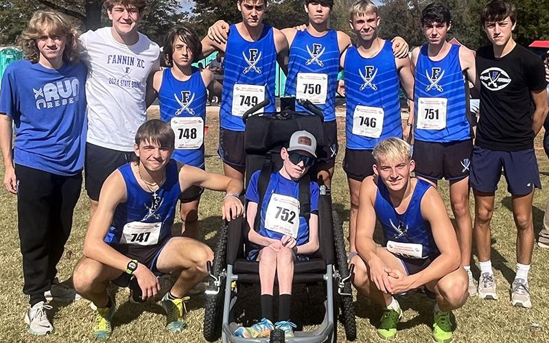 The Fannin County High School boys cross country team placed seventh in the state meet. Shown following the event are, from left, standing, Aiden Jones, Brodey Angel, Joe DiBenedetto, Hudson Lynch, Austin Prieto, Gavin Davis, Henry Scheuneman and Mathew Ponton; and, kneeling, Rylin Davis, Brady Smith and Gage Bryan.