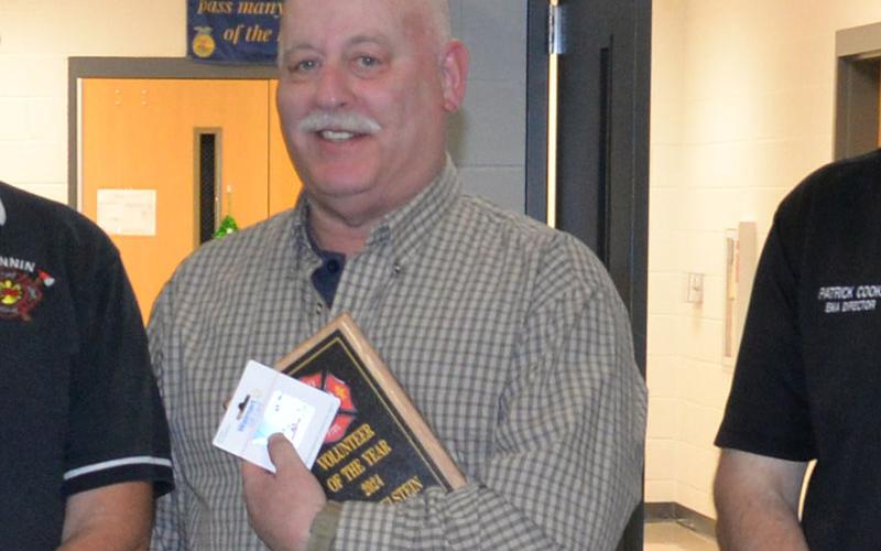 Jim Edelstein holds his recognition as the Fannin County Fire Departments’ Volunteer of the Year. Edelstein is based out of Fire Station 8.