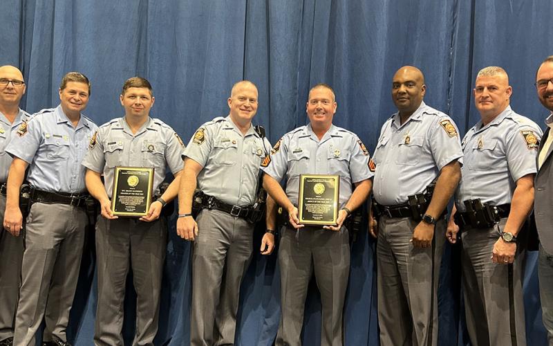 Shown following the award presentations are, from left, Captain Chad Johnson, Colonel Billy Hitchens, Matheson, Trooper First Class Aaron Deyton of Post 27, Bradburn, Lieutenant Colonel Kendrick Lowe, Major Douglas Wilson and McCaysville Police Chief Michael Earley, coordinator of the Appalachian Trail Traffic Enforcement Network.