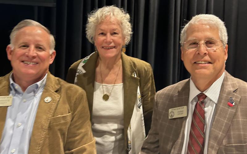 State Representative Johnny Chastain, left, was joined by House Natural Resources and Environment Chair Lynn Smith and Representative Stan Gunter in celebrating the committee’s fishing report.