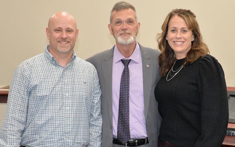 Philip Owensby was sworn in as a clerk in Fannin County Magistrate Court. He is shown with his wife, Sarah Owensby, right, and Chief Magistrate Judge Brian Jones, center.