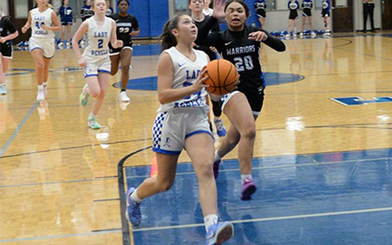 Saidee Patton eyes the basket for the Lady Rebels. She scored four points against Armuchee Saturday.