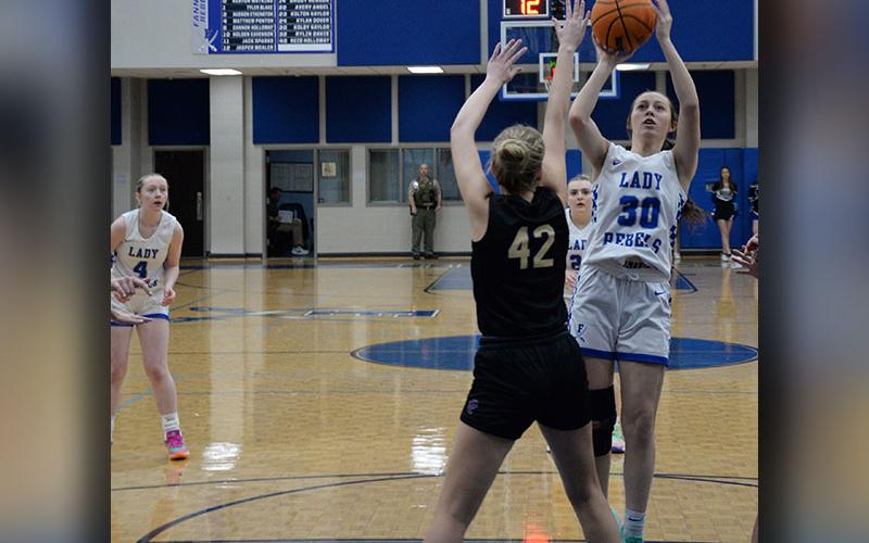 Fannin County’s Avi Ethington eyes two points from the paint in action earlier this season. She scored three points in the Lady Rebels region win over Gordon Lee.