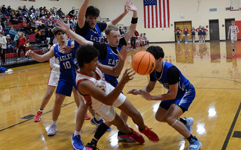 Copper Basin’s Darrius Harris fights to keep the ball in bounds for Copper Basin in recent action. The Cougars posted a big win last Monday when they traveled to Whitwell to face the Tigers.