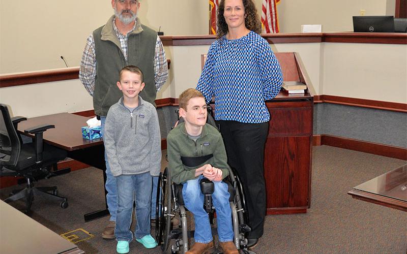 Ashley H. Weeks, right, one of three new Fannin County Board of Education members, is shown with her family, Stacy Weeks, Boyd Weeks and Brady Smith following a special ceremony at the Fannin County Courthouse Friday.
