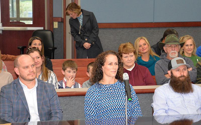 New Fannin County school board members Adam Born, Ashley Herendon Weeks and Robert Patterson, from left, wait Friday, January 3, to take their oaths of office.