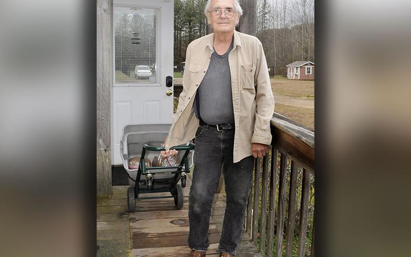 Humane Society of Blue Ridge volunteer David Hungerford is pictured during their pet food distribution day Friday, December 27.