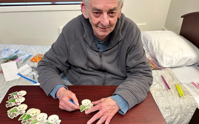 PruittHealth of Blue Ridge resident, Roy Hooker helped make Christmas ornaments for the victims of Hurricane Helene in Asheville, North Carolina.