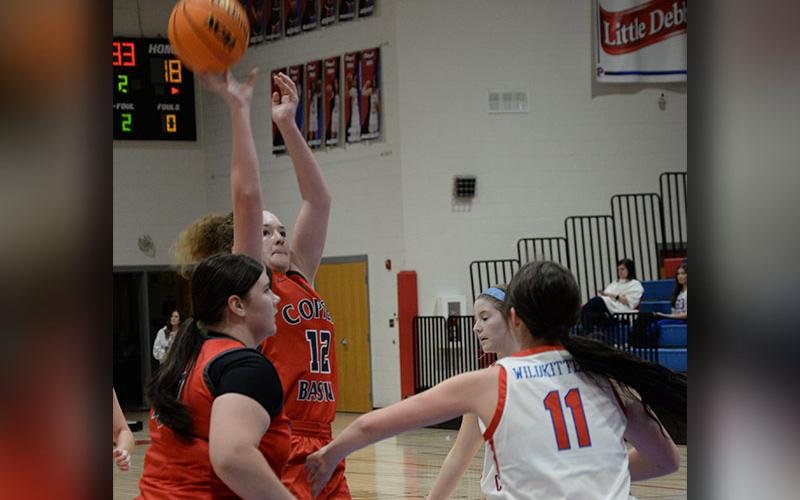 Kloie Ballew goes for two points with Alyvia Harris ready for the followup for Copper Basin.