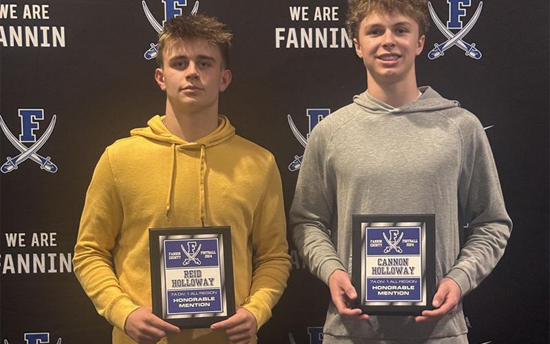 Reid Holloway, left, and Cannon Holloway both earned Honorable Mention All Region honors for the Fannin County Rebels football team.