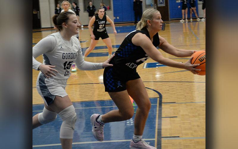 Emma Holloway outruns her Gordon Lee opponent to grab this rebound in action Friday night in the Fannin County High School gym. Buchanan was one of three Lady Rebel seniors playing their last regular season game on the home floor.