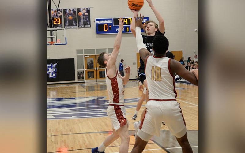 Hudson Ethington goes for two of his 17 points in the Region Championship game against Christian Heritage.