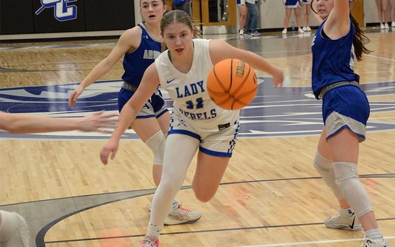 Izzie Jabaley chases down a loose ball in the Region Championship game Friday night in Calhoun.