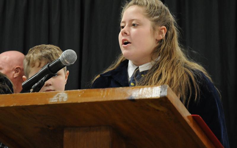 Fannin County Middle School FFA President Lauren Waters speaks of the organization during the Fannin County Young Farmers Association’s Awards Banquet Friday, January 24.