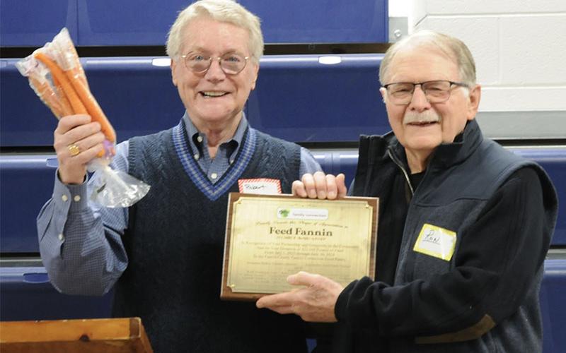 On behalf of Fannin County Family Connection board Vice Chair Robert Gleadall presented Feed Fannin with a “24 Carrot” award to show their appreciation. Feed Fannin Chair Ron Ciochon accepts the recognition.