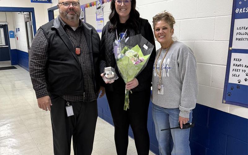 Megan Orton, middle, is Blue Ridge Elementary School’s 2026 Teacher of the Year. She is shown with Principal Mark Young and Assistant Principal Lisa Taylor.