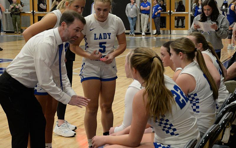 Fannin County Lady Rebels Head Coach Ryan Chastain gives the team instructions during the battle for the Region Championship Friday night, February 14, in Calhoun.