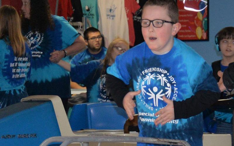 Brayden, a preschool student at Blue Ridge Elementary, is excited to see how many pins he knock down during Special Olympics bowling Friday, March 7, at Fannin Lanes in Blue Ridge.