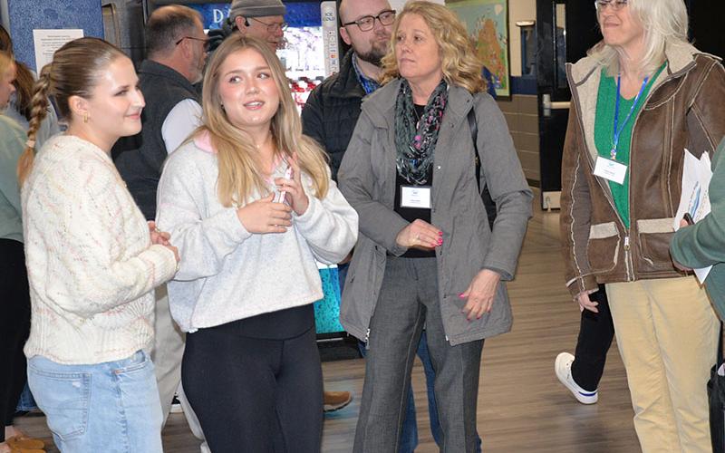 News Observer photo/Glenn Harbison Fannin County High School students Elle Hodgson and Baylei Todd, from left, guided Leadership Fannin class members Jahna Allen, Ray Higginbotham (background) and Anita Hardy on a tour through the school.
