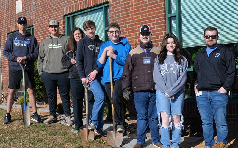 These Fannin County students were among the teams landscaping around the Fannin County Courthouse. From left are Austin Prieto, Logan Wright, Ellen Fay, James Burrell, Cameron Quinn, Jericho Shepherd, Alyssa Marshall and Agriculture Teacher Seth Davis.