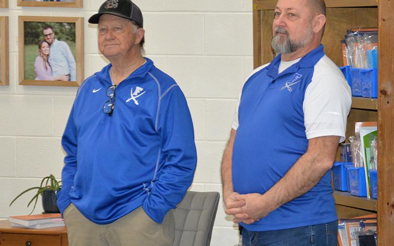 Fannin County school board members Bobby Bearden, left, and Mike Cole hear an update at Blue Ridge Elementary School.