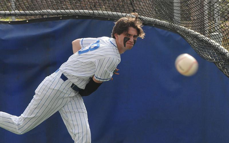 Fannin County Rebel pitcher Bristol Hughes practices before a game against the Armuchee Indians March 13.
