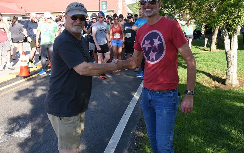 McCaysville Mayor Terry Arp, left, and Copperhill Mayor Greg Barker celebrate a cooperative atmosphere between the two cities.